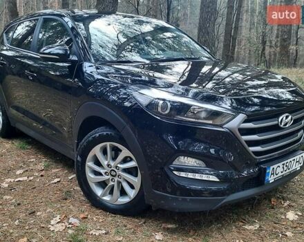 Черный Хендай Туксон, объемом двигателя 2 л и пробегом 100 тыс. км за 17200 $, фото 5 на Automoto.ua