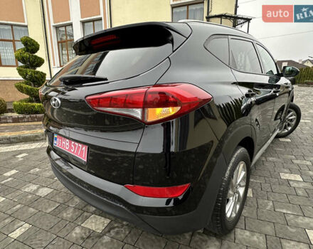 Черный Хендай Туксон, объемом двигателя 2 л и пробегом 156 тыс. км за 12800 $, фото 58 на Automoto.ua