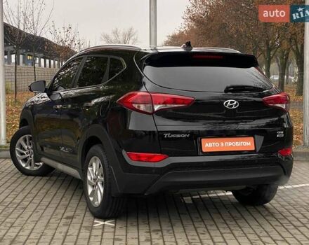 Черный Хендай Туксон, объемом двигателя 2 л и пробегом 106 тыс. км за 19500 $, фото 7 на Automoto.ua