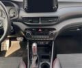 Черный Хендай Туксон, объемом двигателя 1.6 л и пробегом 58 тыс. км за 10900 $, фото 4 на Automoto.ua