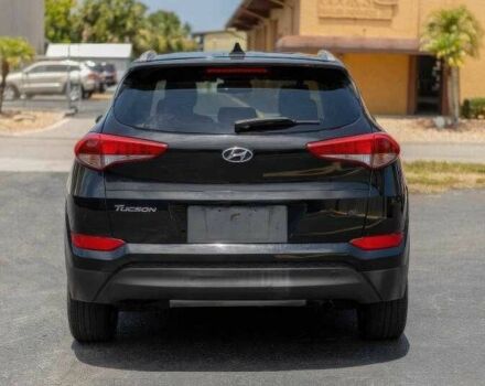 Черный Хендай Туксон, объемом двигателя 2 л и пробегом 89 тыс. км за 11200 $, фото 3 на Automoto.ua