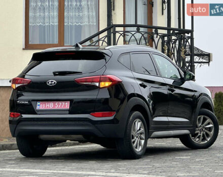 Черный Хендай Туксон, объемом двигателя 2 л и пробегом 156 тыс. км за 12800 $, фото 49 на Automoto.ua