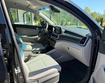 Черный Хендай Туксон, объемом двигателя 2 л и пробегом 80 тыс. км за 9500 $, фото 18 на Automoto.ua