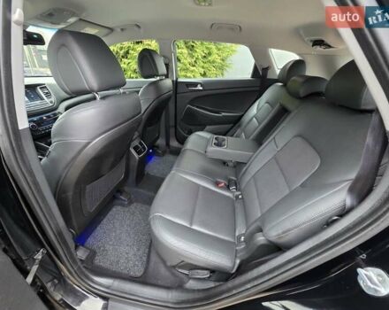 Черный Хендай Туксон, объемом двигателя 2 л и пробегом 151 тыс. км за 18950 $, фото 73 на Automoto.ua