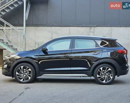 Черный Хендай Туксон, объемом двигателя 2 л и пробегом 108 тыс. км за 25500 $, фото 1 на Automoto.ua