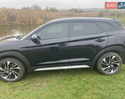 Черный Хендай Туксон, объемом двигателя 2.36 л и пробегом 68 тыс. км за 19000 $, фото 2 на Automoto.ua