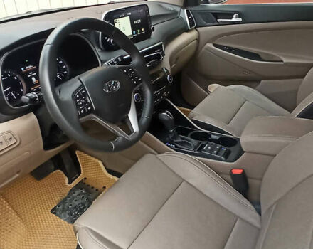 Чорний Хендай Туксон, об'ємом двигуна 2.4 л та пробігом 13 тис. км за 32000 $, фото 4 на Automoto.ua