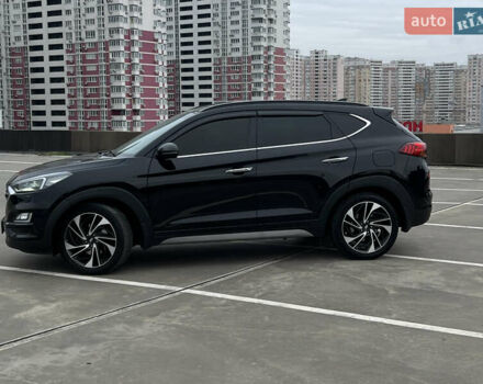 Чорний Хендай Туксон, об'ємом двигуна 2 л та пробігом 145 тис. км за 23900 $, фото 3 на Automoto.ua