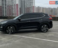 Чорний Хендай Туксон, об'ємом двигуна 2 л та пробігом 145 тис. км за 23900 $, фото 3 на Automoto.ua