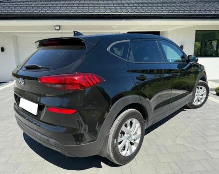 Черный Хендай Туксон, объемом двигателя 2 л и пробегом 80 тыс. км за 9500 $, фото 5 на Automoto.ua