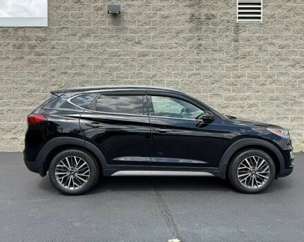 Черный Хендай Туксон, объемом двигателя 2.4 л и пробегом 42 тыс. км за 4100 $, фото 5 на Automoto.ua