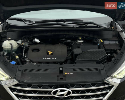 Чорний Хендай Туксон, об'ємом двигуна 2 л та пробігом 145 тис. км за 23900 $, фото 14 на Automoto.ua