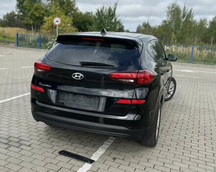 Чорний Хендай Туксон, об'ємом двигуна 2 л та пробігом 173 тис. км за 14700 $, фото 9 на Automoto.ua