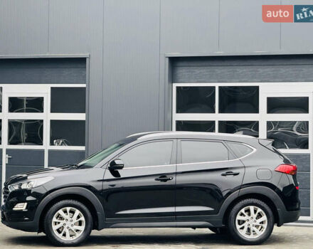 Чорний Хендай Туксон, об'ємом двигуна 2 л та пробігом 84 тис. км за 19000 $, фото 7 на Automoto.ua