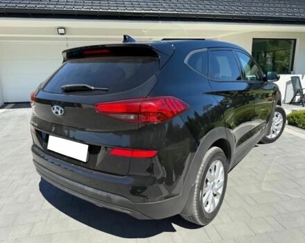 Черный Хендай Туксон, объемом двигателя 2 л и пробегом 80 тыс. км за 9500 $, фото 6 на Automoto.ua