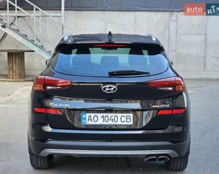 Черный Хендай Туксон, объемом двигателя 2 л и пробегом 108 тыс. км за 25500 $, фото 3 на Automoto.ua