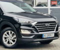 Чорний Хендай Туксон, об'ємом двигуна 2 л та пробігом 84 тис. км за 19000 $, фото 1 на Automoto.ua