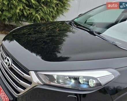 Черный Хендай Туксон, объемом двигателя 2 л и пробегом 151 тыс. км за 18950 $, фото 15 на Automoto.ua