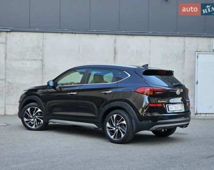 Черный Хендай Туксон, объемом двигателя 2 л и пробегом 108 тыс. км за 25500 $, фото 2 на Automoto.ua