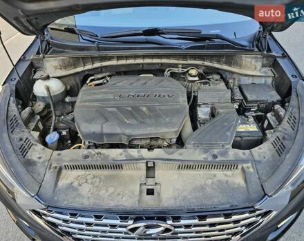 Черный Хендай Туксон, объемом двигателя 2 л и пробегом 108 тыс. км за 25500 $, фото 16 на Automoto.ua