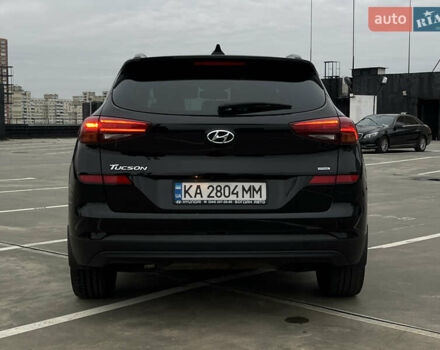 Чорний Хендай Туксон, об'ємом двигуна 2 л та пробігом 145 тис. км за 23900 $, фото 7 на Automoto.ua