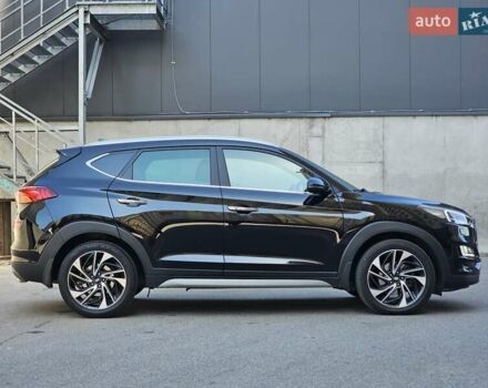 Черный Хендай Туксон, объемом двигателя 2 л и пробегом 108 тыс. км за 25500 $, фото 5 на Automoto.ua
