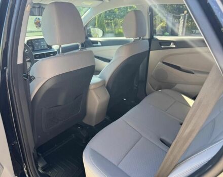 Черный Хендай Туксон, объемом двигателя 2 л и пробегом 80 тыс. км за 9500 $, фото 16 на Automoto.ua