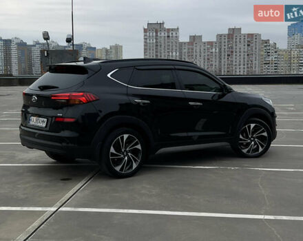 Чорний Хендай Туксон, об'ємом двигуна 2 л та пробігом 145 тис. км за 23900 $, фото 10 на Automoto.ua