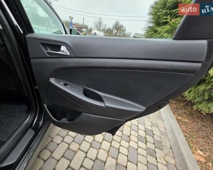 Черный Хендай Туксон, объемом двигателя 2 л и пробегом 151 тыс. км за 18950 $, фото 66 на Automoto.ua