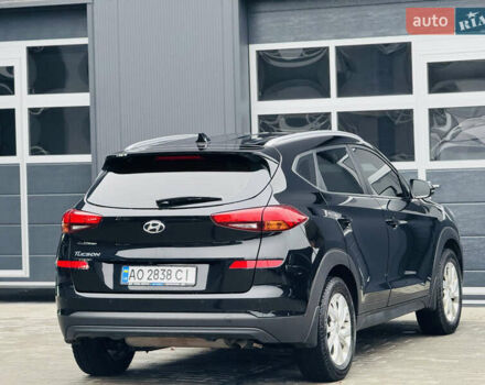 Чорний Хендай Туксон, об'ємом двигуна 2 л та пробігом 84 тис. км за 19000 $, фото 14 на Automoto.ua