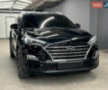 Черный Хендай Туксон, объемом двигателя 2 л и пробегом 150 тыс. км за 22000 $, фото 1 на Automoto.ua