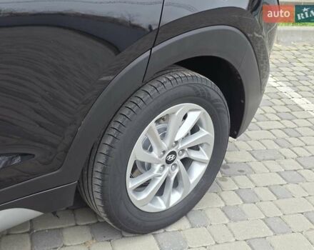 Черный Хендай Туксон, объемом двигателя 2 л и пробегом 151 тыс. км за 18950 $, фото 23 на Automoto.ua