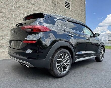 Черный Хендай Туксон, объемом двигателя 2.4 л и пробегом 42 тыс. км за 4100 $, фото 3 на Automoto.ua