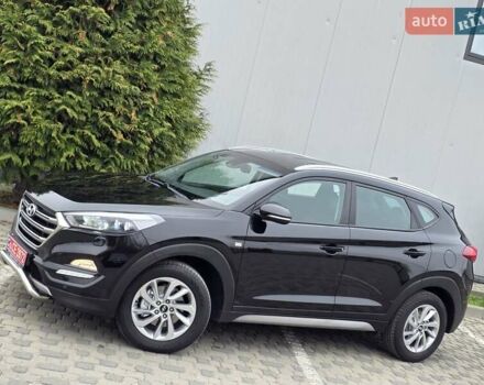 Черный Хендай Туксон, объемом двигателя 2 л и пробегом 151 тыс. км за 18950 $, фото 12 на Automoto.ua