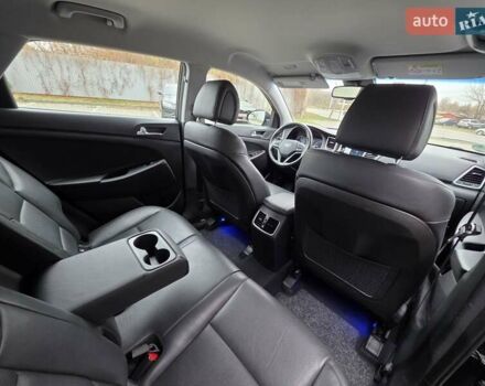 Черный Хендай Туксон, объемом двигателя 2 л и пробегом 151 тыс. км за 18950 $, фото 58 на Automoto.ua