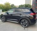 Чорний Хендай Туксон, об'ємом двигуна 2 л та пробігом 120 тис. км за 15500 $, фото 3 на Automoto.ua