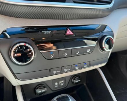 Черный Хендай Туксон, объемом двигателя 2 л и пробегом 80 тыс. км за 9500 $, фото 13 на Automoto.ua