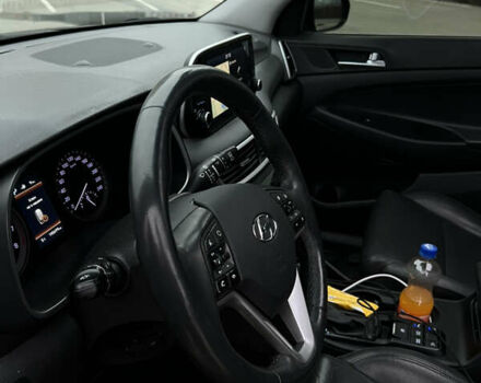 Чорний Хендай Туксон, об'ємом двигуна 2 л та пробігом 145 тис. км за 23900 $, фото 26 на Automoto.ua