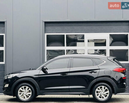 Чорний Хендай Туксон, об'ємом двигуна 2 л та пробігом 84 тис. км за 19000 $, фото 8 на Automoto.ua