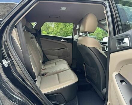 Черный Хендай Туксон, объемом двигателя 2.4 л и пробегом 42 тыс. км за 4100 $, фото 11 на Automoto.ua