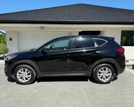 Черный Хендай Туксон, объемом двигателя 2 л и пробегом 80 тыс. км за 9500 $, фото 2 на Automoto.ua