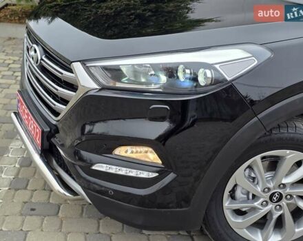 Черный Хендай Туксон, объемом двигателя 2 л и пробегом 151 тыс. км за 18950 $, фото 14 на Automoto.ua