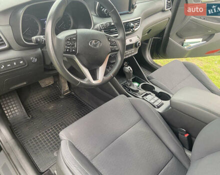 Черный Хендай Туксон, объемом двигателя 2.36 л и пробегом 68 тыс. км за 19000 $, фото 10 на Automoto.ua