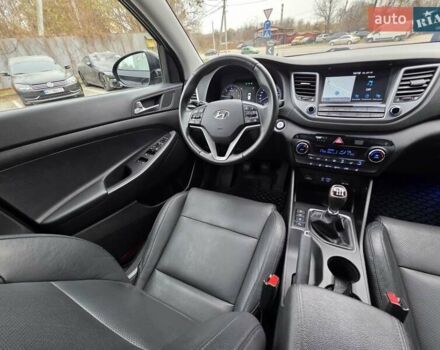 Черный Хендай Туксон, объемом двигателя 2 л и пробегом 151 тыс. км за 18950 $, фото 78 на Automoto.ua