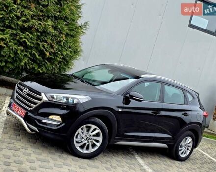 Черный Хендай Туксон, объемом двигателя 2 л и пробегом 151 тыс. км за 18950 $, фото 4 на Automoto.ua