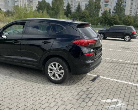 Чорний Хендай Туксон, об'ємом двигуна 2 л та пробігом 173 тис. км за 14700 $, фото 12 на Automoto.ua