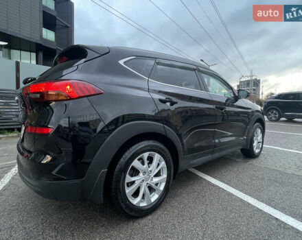 Черный Хендай Туксон, объемом двигателя 2 л и пробегом 103 тыс. км за 20900 $, фото 9 на Automoto.ua