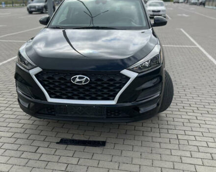 Чорний Хендай Туксон, об'ємом двигуна 2 л та пробігом 173 тис. км за 14700 $, фото 2 на Automoto.ua