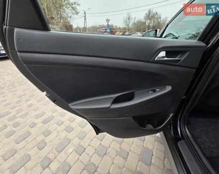 Черный Хендай Туксон, объемом двигателя 2 л и пробегом 151 тыс. км за 18950 $, фото 76 на Automoto.ua