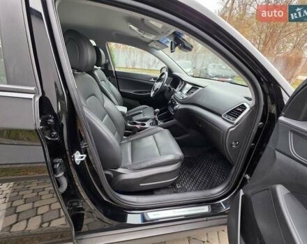 Черный Хендай Туксон, объемом двигателя 2 л и пробегом 151 тыс. км за 18950 $, фото 55 на Automoto.ua